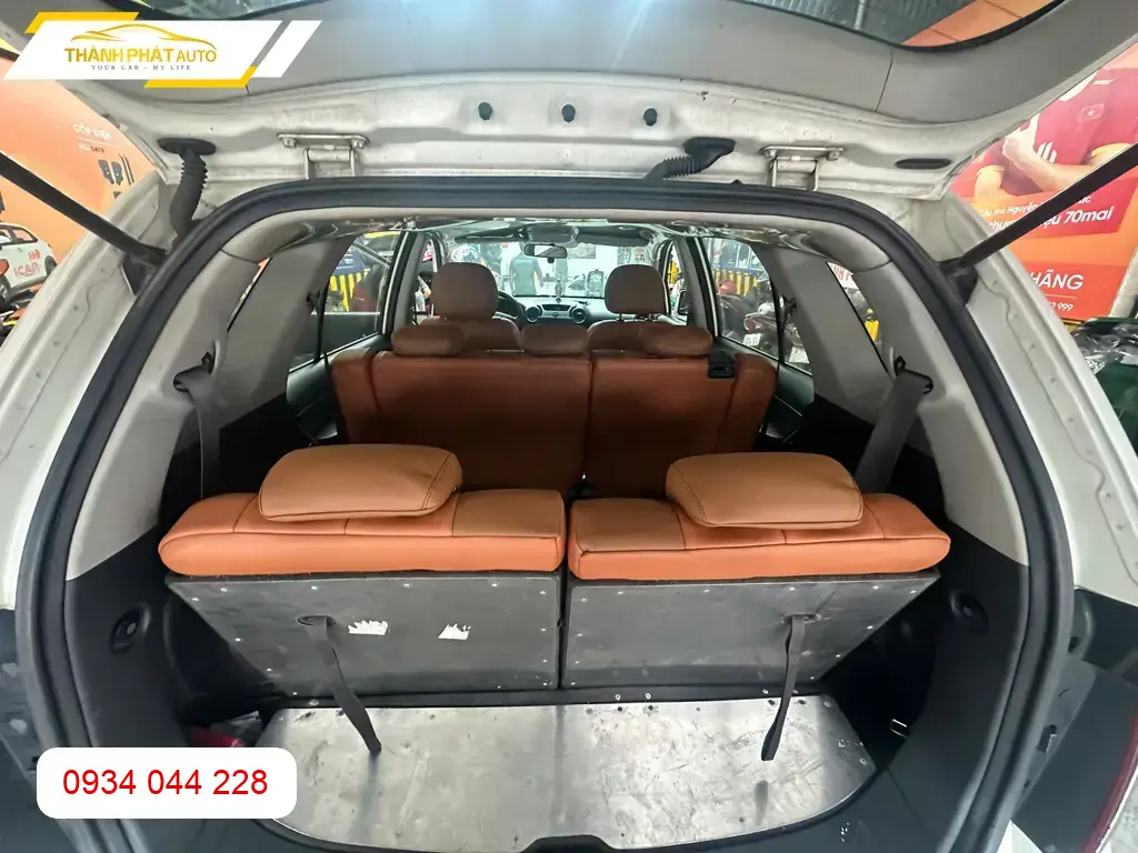 Chú Văn bọc ghế da công nghiệp Kia Carens 2015 tại Quận 12 vì ghế cũ xuống cấp ảnh thực tế 5