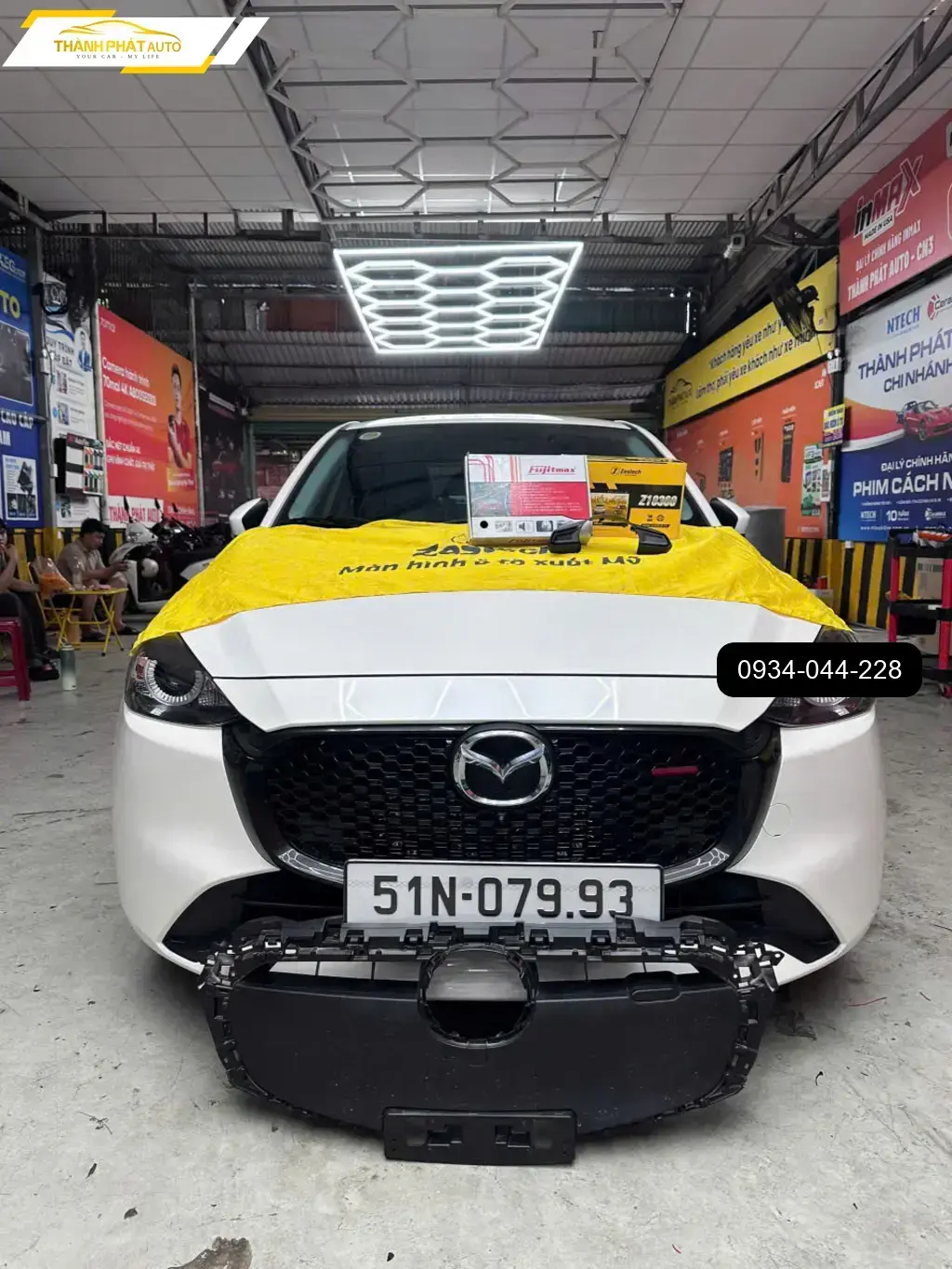 Chị Mai lắp mặt galang Mazda 2 uy tín tại Quận 12 ảnh thực tế 3